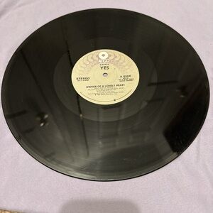 Yes - "Owner Of A Lonely Heart” and “Our Song” vinyl 1983